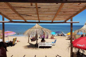 Casa de Praia - Charmoso Chalé La Balconada